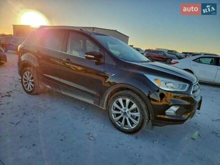 Черный Форд Эскейп, объемом двигателя 2 л и пробегом 158 тыс. км за 4400 $, фото 1 на Automoto.ua