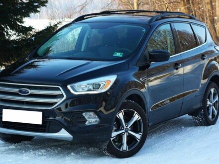 Чорний Форд Ескейп, об'ємом двигуна 2 л та пробігом 132 тис. км за 9400 $, фото 1 на Automoto.ua