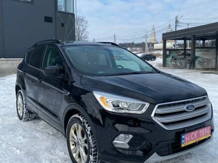 Чорний Форд Ескейп, об'ємом двигуна 1.5 л та пробігом 145 тис. км за 11499 $, фото 1 на Automoto.ua