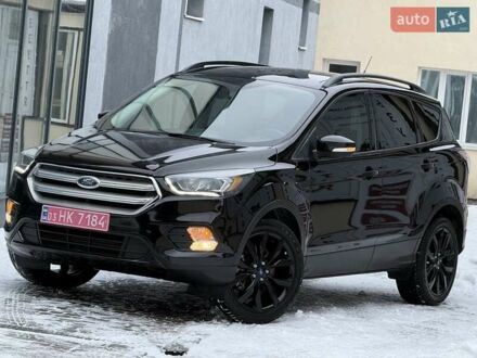 Черный Форд Эскейп, объемом двигателя 2 л и пробегом 175 тыс. км за 12950 $, фото 1 на Automoto.ua