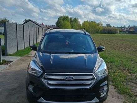 Черный Форд Эскейп, объемом двигателя 2 л и пробегом 105 тыс. км за 8800 $, фото 1 на Automoto.ua