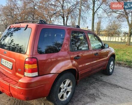Красный Форд Эскейп, объемом двигателя 3 л и пробегом 230 тыс. км за 4999 $, фото 3 на Automoto.ua