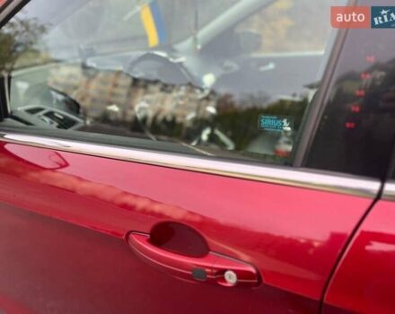 Красный Форд Эскейп, объемом двигателя 2 л и пробегом 148 тыс. км за 13250 $, фото 3 на Automoto.ua