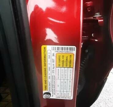 Красный Форд Эскейп, объемом двигателя 2 л и пробегом 93 тыс. км за 11300 $, фото 11 на Automoto.ua