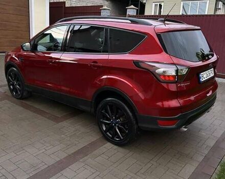 Красный Форд Эскейп, объемом двигателя 2 л и пробегом 170 тыс. км за 13500 $, фото 2 на Automoto.ua