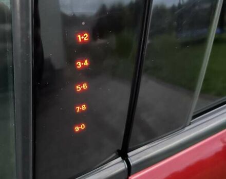 Красный Форд Эскейп, объемом двигателя 2 л и пробегом 170 тыс. км за 13500 $, фото 4 на Automoto.ua