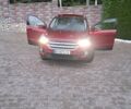 Красный Форд Эскейп, объемом двигателя 2 л и пробегом 61 тыс. км за 16350 $, фото 1 на Automoto.ua
