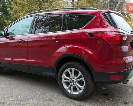 Красный Форд Эскейп, объемом двигателя 2 л и пробегом 140 тыс. км за 14800 $, фото 5 на Automoto.ua
