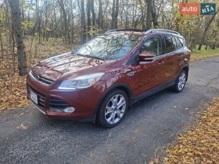 Красный Форд Эскейп, объемом двигателя 2 л и пробегом 118 тыс. км за 12700 $, фото 1 на Automoto.ua