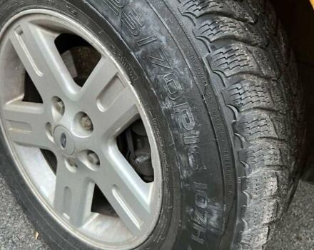 Желтый Форд Эскейп, объемом двигателя 2.5 л и пробегом 226 тыс. км за 4999 $, фото 6 на Automoto.ua