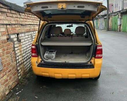 Желтый Форд Эскейп, объемом двигателя 2.5 л и пробегом 226 тыс. км за 4999 $, фото 3 на Automoto.ua