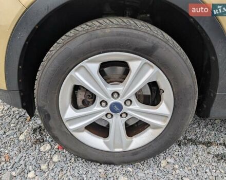 Желтый Форд Эскейп, объемом двигателя 1.6 л и пробегом 191 тыс. км за 8550 $, фото 20 на Automoto.ua