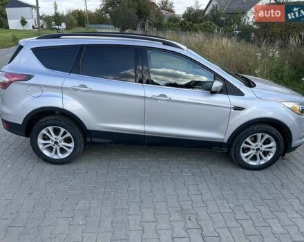 Серый Форд Эскейп, объемом двигателя 2 л и пробегом 231 тыс. км за 12100 $, фото 1 на Automoto.ua