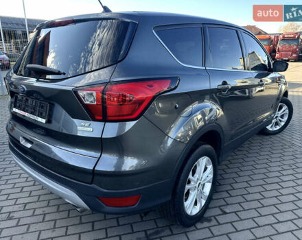 Сірий Форд Ескейп, об'ємом двигуна 1.5 л та пробігом 215 тис. км за 9699 $, фото 2 на Automoto.ua