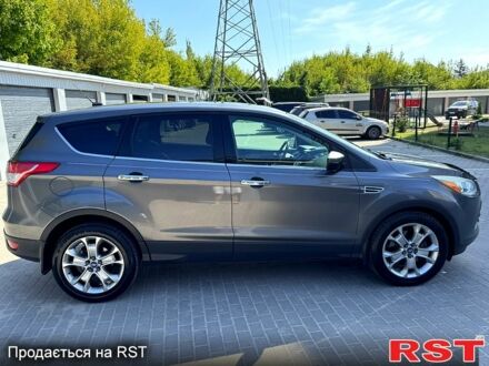 Серый Форд Эскейп, объемом двигателя 2 л и пробегом 185 тыс. км за 12499 $, фото 1 на Automoto.ua