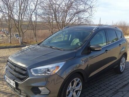 Серый Форд Эскейп, объемом двигателя 2 л и пробегом 135 тыс. км за 14800 $, фото 1 на Automoto.ua