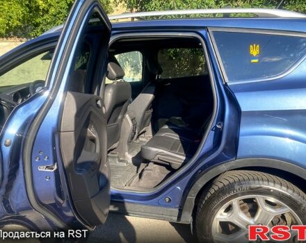 Синий Форд Эскейп, объемом двигателя 2 л и пробегом 65 тыс. км за 14000 $, фото 3 на Automoto.ua