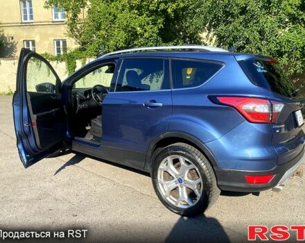 Синий Форд Эскейп, объемом двигателя 2 л и пробегом 65 тыс. км за 14000 $, фото 2 на Automoto.ua