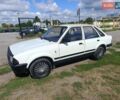 Белый Форд Эскорт, объемом двигателя 1.4 л и пробегом 286 тыс. км за 750 $, фото 1 на Automoto.ua