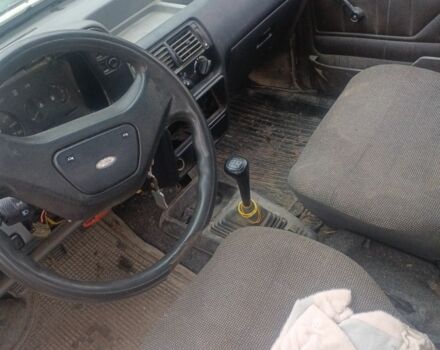 Белый Форд Эскорт, объемом двигателя 2 л и пробегом 200 тыс. км за 947 $, фото 3 на Automoto.ua