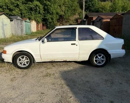 Білий Форд Ескорт, об'ємом двигуна 1.4 л та пробігом 250 тис. км за 1000 $, фото 7 на Automoto.ua