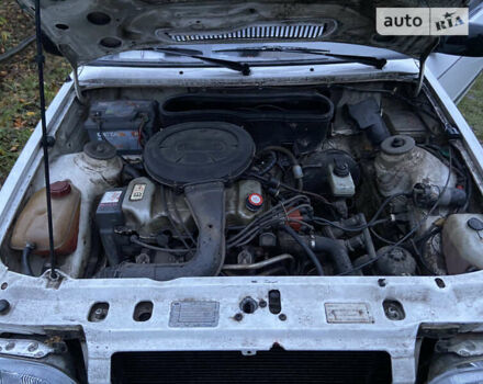 Білий Форд Ескорт, об'ємом двигуна 1.4 л та пробігом 268 тис. км за 1100 $, фото 5 на Automoto.ua