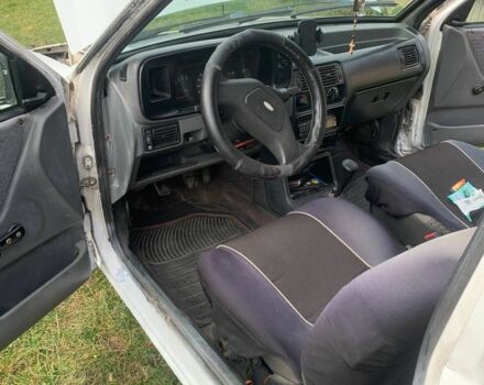 Белый Форд Эскорт, объемом двигателя 1.3 л и пробегом 77 тыс. км за 800 $, фото 8 на Automoto.ua