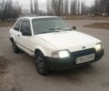 Белый Форд Эскорт, объемом двигателя 1.4 л и пробегом 300 тыс. км за 400 $, фото 1 на Automoto.ua