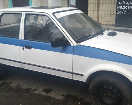 Белый Форд Эскорт, объемом двигателя 1.4 л и пробегом 89 тыс. км за 900 $, фото 1 на Automoto.ua