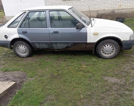 Белый Форд Эскорт, объемом двигателя 1.3 л и пробегом 123 тыс. км за 299 $, фото 1 на Automoto.ua