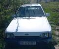 Белый Форд Эскорт, объемом двигателя 1.4 л и пробегом 120 тыс. км за 400 $, фото 1 на Automoto.ua