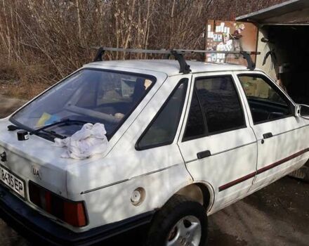 Белый Форд Эскорт, объемом двигателя 1.4 л и пробегом 400 тыс. км за 591 $, фото 1 на Automoto.ua