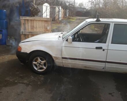 Белый Форд Эскорт, объемом двигателя 1.4 л и пробегом 400 тыс. км за 591 $, фото 5 на Automoto.ua