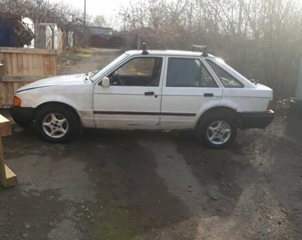 Белый Форд Эскорт, объемом двигателя 1.4 л и пробегом 400 тыс. км за 591 $, фото 3 на Automoto.ua