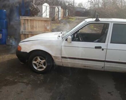 Белый Форд Эскорт, объемом двигателя 1.4 л и пробегом 400 тыс. км за 591 $, фото 4 на Automoto.ua