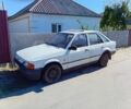 Білий Форд Ескорт, об'ємом двигуна 1 л та пробігом 240 тис. км за 400 $, фото 2 на Automoto.ua