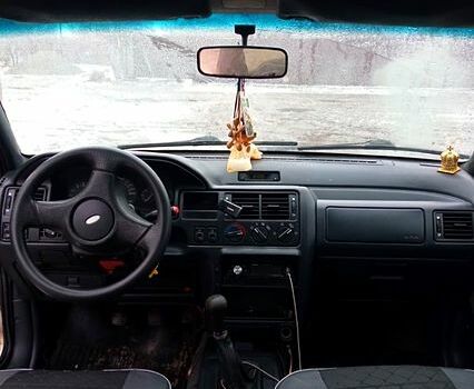 Білий Форд Ескорт, об'ємом двигуна 1.3 л та пробігом 400 тис. км за 530 $, фото 1 на Automoto.ua