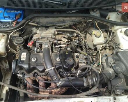 Белый Форд Эскорт, объемом двигателя 1.39 л и пробегом 100 тыс. км за 1000 $, фото 7 на Automoto.ua