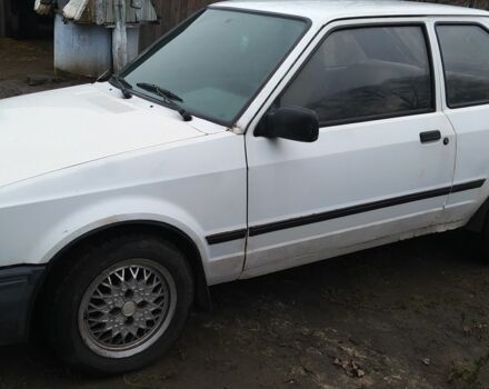 Белый Форд Эскорт, объемом двигателя 1.6 л и пробегом 300 тыс. км за 343 $, фото 1 на Automoto.ua