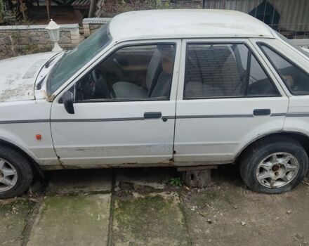 Білий Форд Ескорт, об'ємом двигуна 1.6 л та пробігом 12 тис. км за 238 $, фото 1 на Automoto.ua