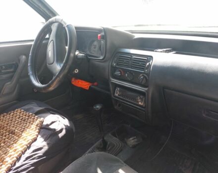 Белый Форд Эскорт, объемом двигателя 1 л и пробегом 300 тыс. км за 1500 $, фото 4 на Automoto.ua