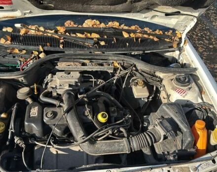 Белый Форд Эскорт, объемом двигателя 1.3 л и пробегом 150 тыс. км за 300 $, фото 6 на Automoto.ua