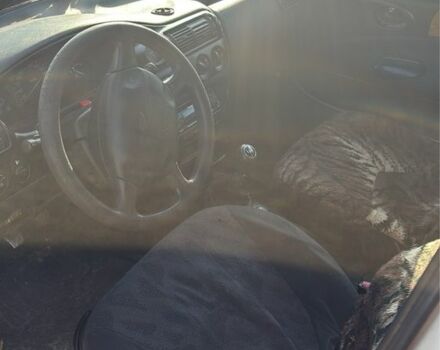 Белый Форд Эскорт, объемом двигателя 1.3 л и пробегом 150 тыс. км за 300 $, фото 4 на Automoto.ua