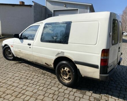 Білий Форд Ескорт, об'ємом двигуна 1.8 л та пробігом 300 тис. км за 699 $, фото 4 на Automoto.ua