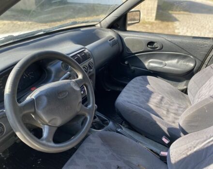 Білий Форд Ескорт, об'ємом двигуна 1.8 л та пробігом 300 тис. км за 699 $, фото 8 на Automoto.ua