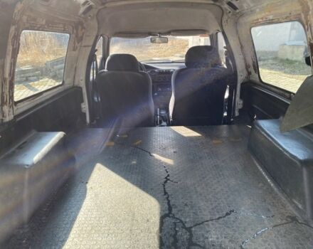 Білий Форд Ескорт, об'ємом двигуна 1.8 л та пробігом 300 тис. км за 699 $, фото 9 на Automoto.ua