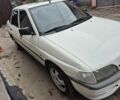 Белый Форд Эскорт, объемом двигателя 1.3 л и пробегом 250 тыс. км за 750 $, фото 1 на Automoto.ua