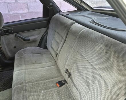 Белый Форд Эскорт, объемом двигателя 1.3 л и пробегом 250 тыс. км за 750 $, фото 6 на Automoto.ua