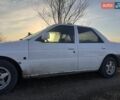 Белый Форд Эскорт, объемом двигателя 1.6 л и пробегом 99 тыс. км за 1050 $, фото 3 на Automoto.ua