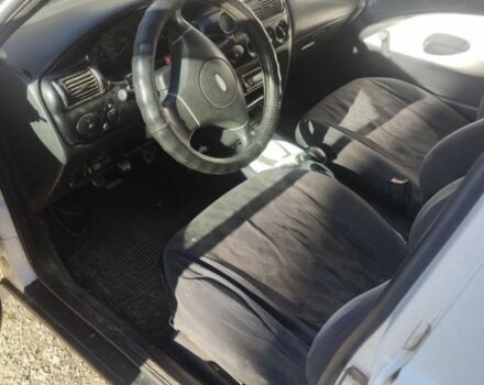 Білий Форд Ескорт, об'ємом двигуна 1.3 л та пробігом 200 тис. км за 946 $, фото 4 на Automoto.ua